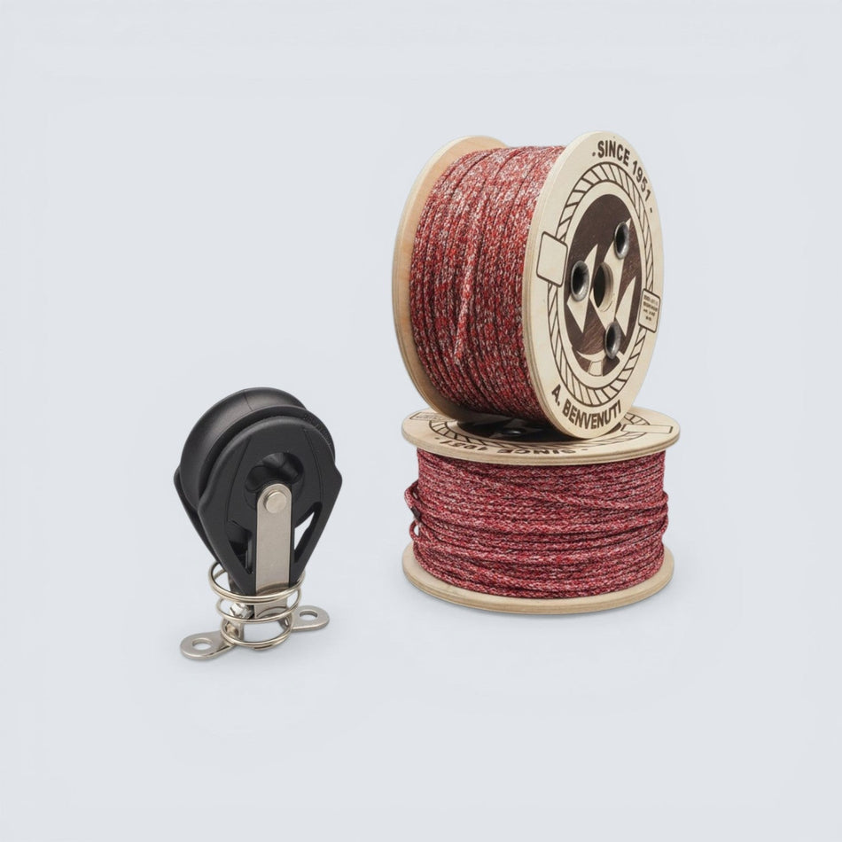 Bild på ett block och röd tamp mot en grå bakgrund.