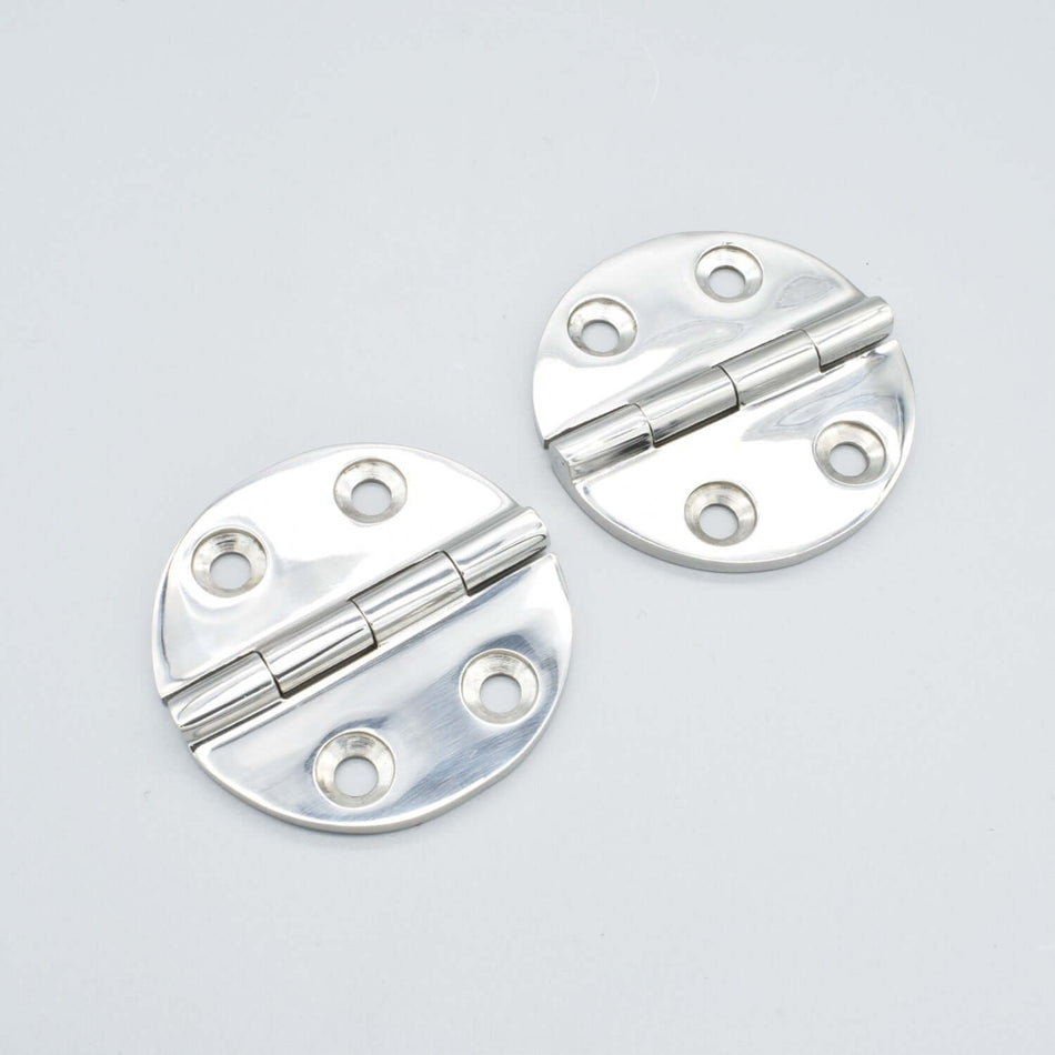 Bild på runda gångjärn i rostfritt stål.