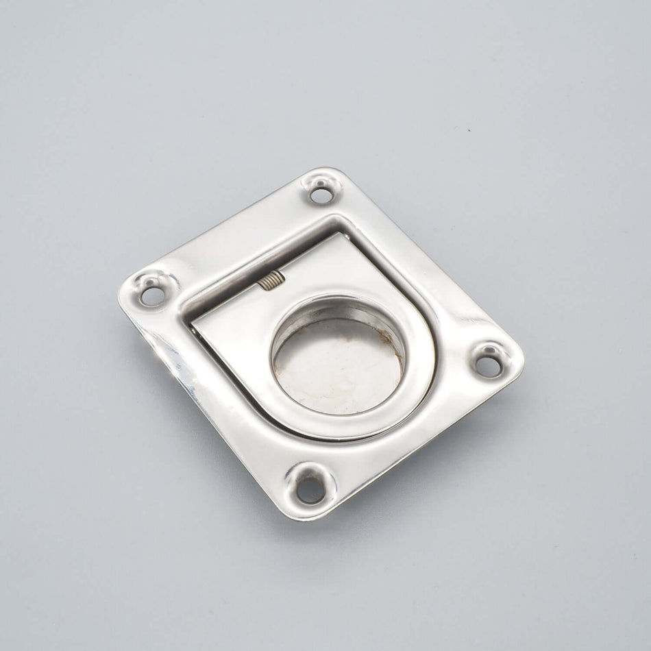 Bild på luckhandtag i rostfritt stål.