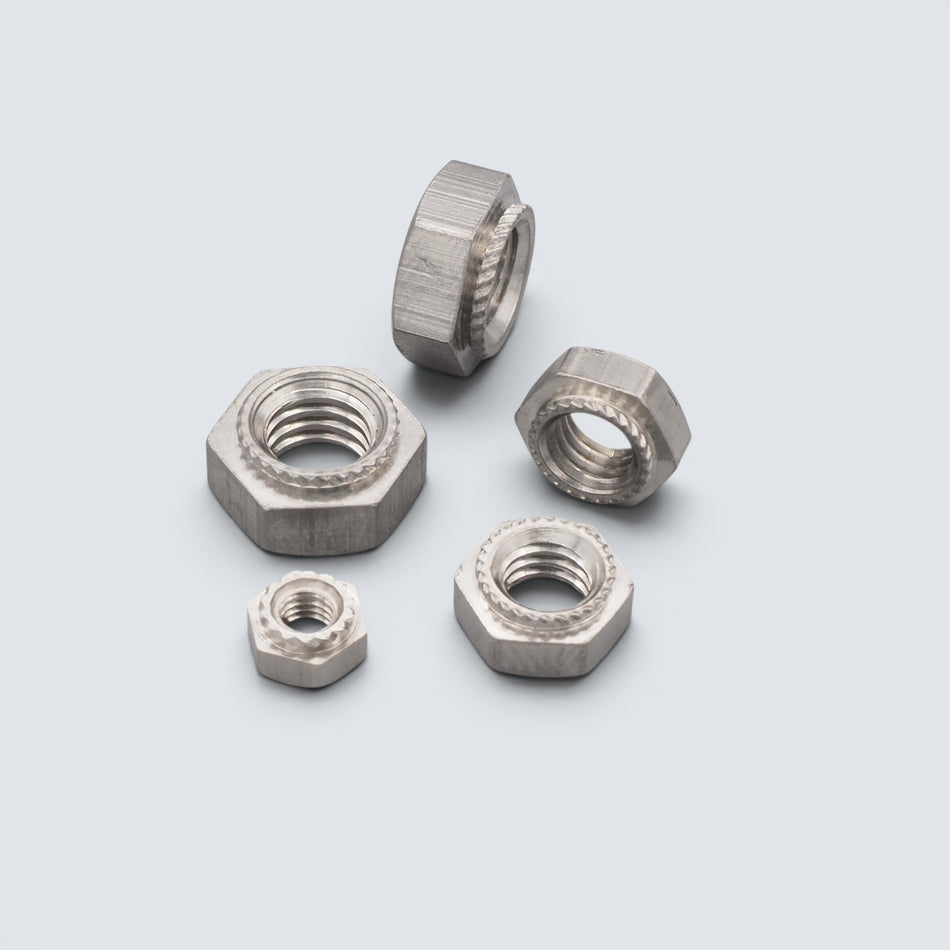 Rostfri.nu A2 stainless steel press nuts with hexagonal heads and serrated collars for sheet metal.